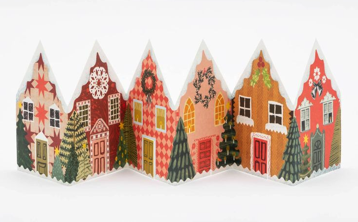 Illustrated row of festive holiday houses decorated with trees and wreaths.